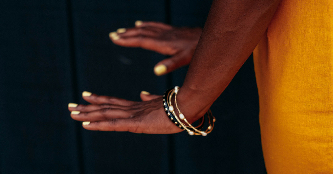 woman holding out her hands