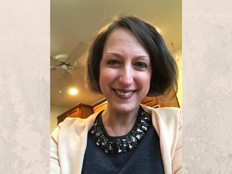 A headshot of Cindy Pellegrini-Johnson