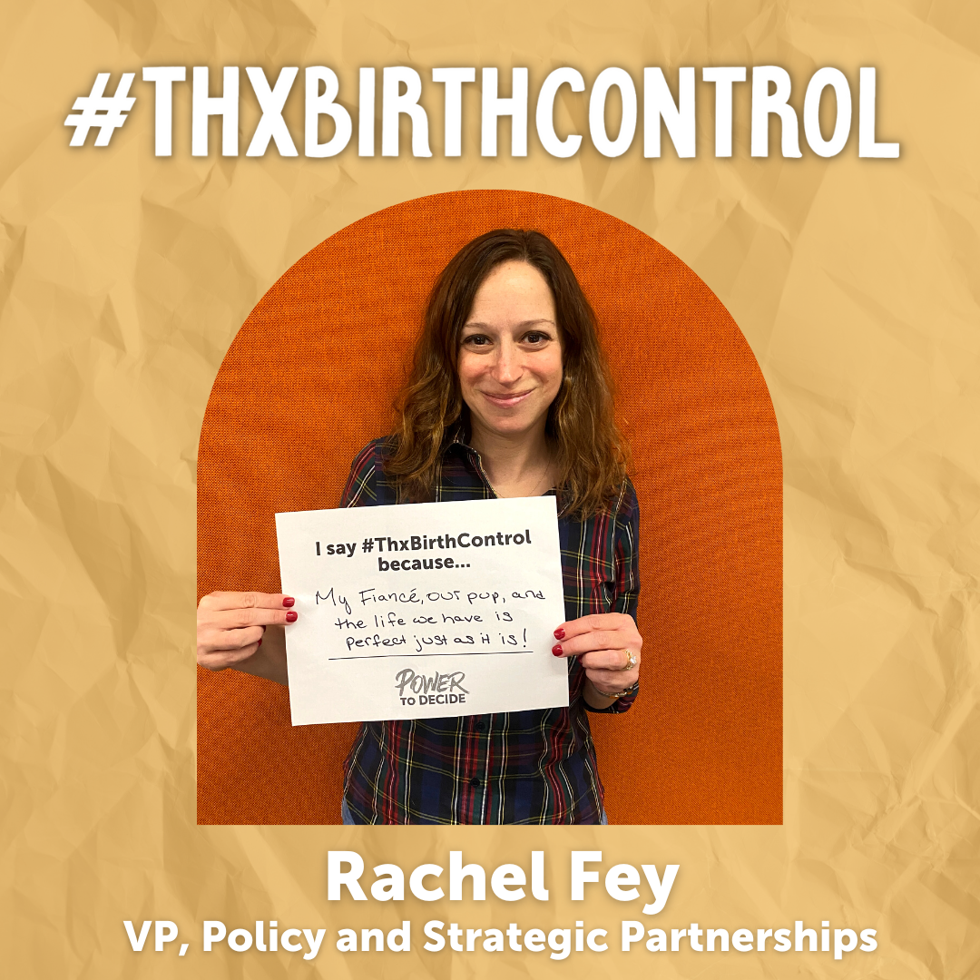 A Power to Decide Staffer holds a sign with their reason for saying #ThxBirthControl.