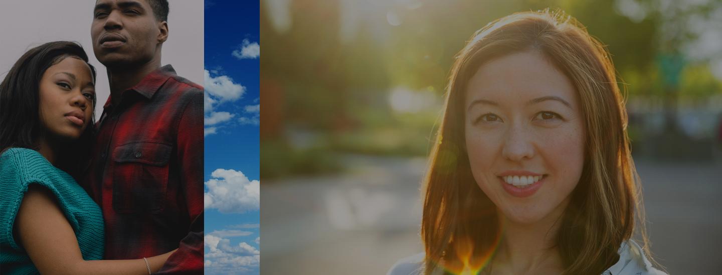 A couple hugs while looking serious while another woman smiles at the camera