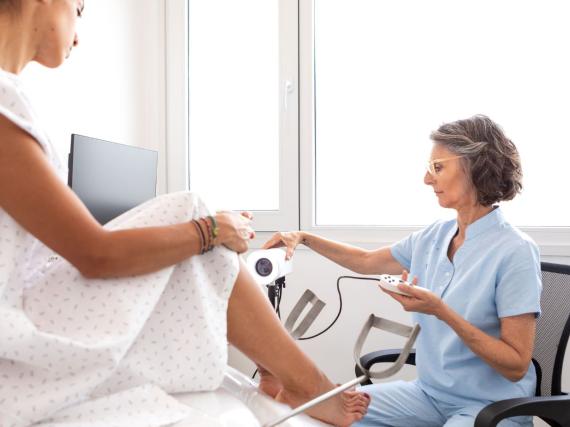 Young woman sitting in clinic