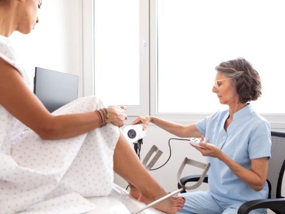 Young woman sitting in clinic